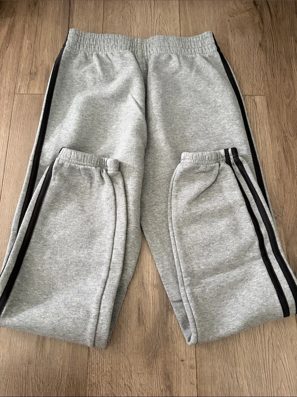adidas Kids Light Gray Sweatpants with Black Stripes. Boys size medium 10/12